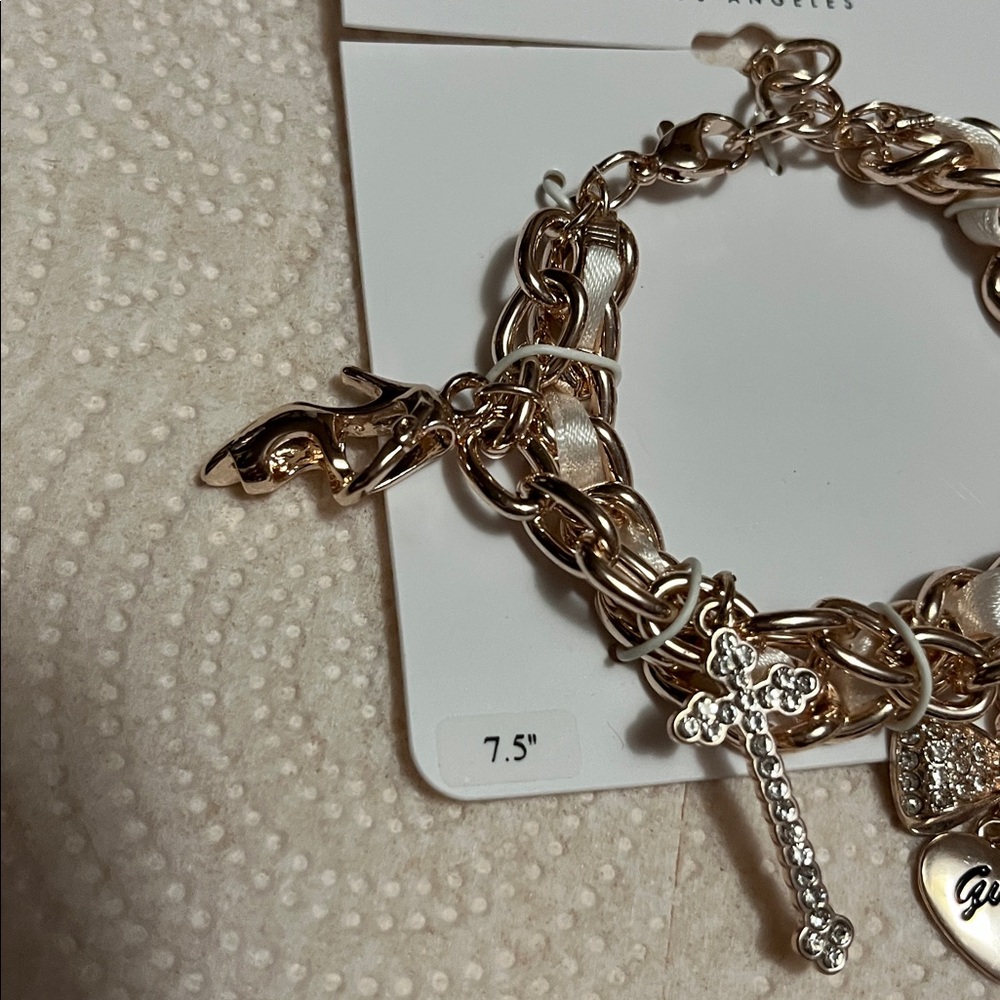 Guess Gold-Tone Charm Bracelet with Sparkling Accents - Picture 4 of 4